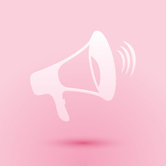 Paper cut Megaphone icon isolated on pink background. Paper art style. Vector.