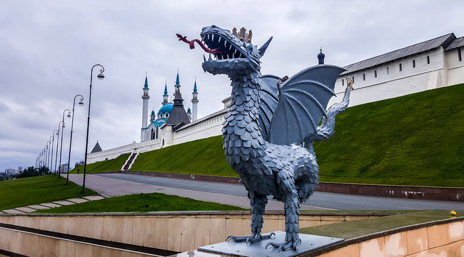 Sculpture of Zilant, a legendary creature, something between a dragon and a wyvern on the background of Kul-Sharif mosque in Kazan Kremlin in Tatarstan, Russia