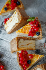 Cheesecake cake with berries. Cake with delicate curd and dough base. High quality photo.