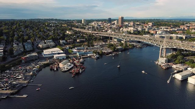 Seattle City Waterway Aerial with Boats Sailing Under I-5 Freeway Bridge
