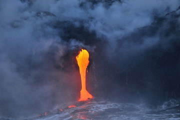 Lava flowing into the ocean from lava volcanic eruption on Big Island Hawaii, USA.