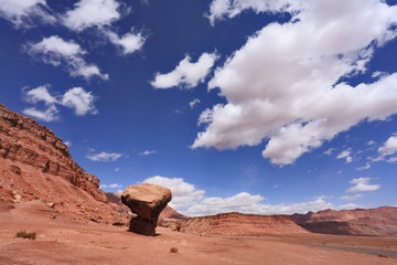 Fototapeta na wymiar American rock desert and glowing clouds