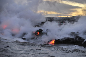 Fototapeta na wymiar Lava flowing into the ocean from lava volcanic eruption on Big Island Hawaii, USA.