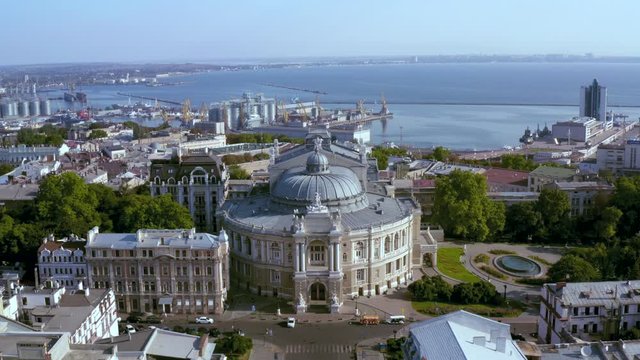 Air panorama of city center, sea port and Opera and Ballet Theater in Odessa Ukraine. Drone footage at sunny day.