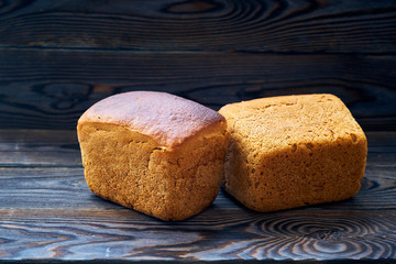 Homemade bread on dark wooden table