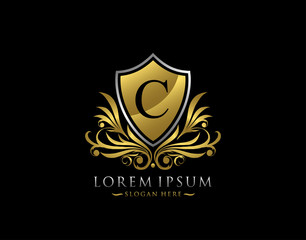 Luxury Shield C Letter Logo. Graceful Elegant gold shield icon design.