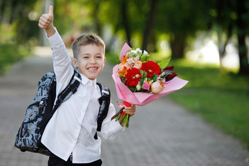 Schoolboy with flowers