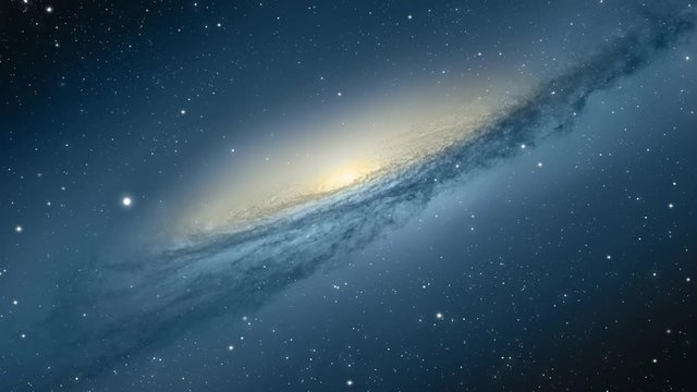 Video of universe flyby. Camera moves towards a galaxy seen at a distance while stars flyby. Apt for motivational and spiritual videos.