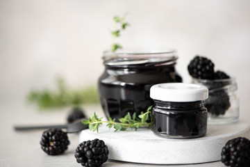 homemade blackberry jam in small jars