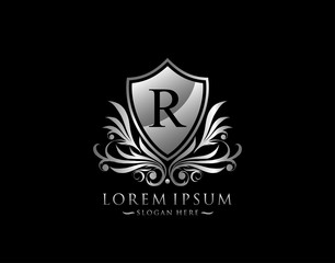 Luxury Shield R Letter Logo. Graceful Elegant Silver shield icon design.