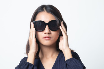 Portrait of a beautiful young asian girl in sunglasses.