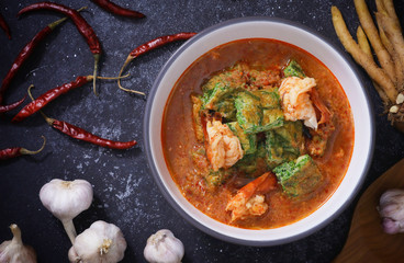 Sour Soup with Shrimp Cha Om Is a spicy Thai food, can taste Thai curry paste, eat with hot rice.