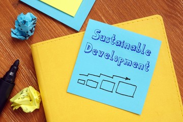 Financial concept about Sustainable development with phrase on the page.