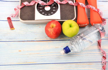 Top iew of Healthy lifestyle with  green and red apples which weight scale for weight loss concept-Copy space
