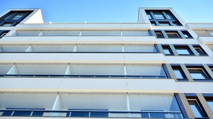 Architectural details of modern apartment building. Modern european residential apartment building complex.