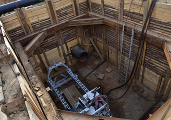 Tunnel boring machine in storm sewer collector for tunneling, auger boring, rock drilling. Jacking...