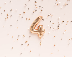 Four year birthday. Number 4 flying foil balloon and confetti. Four-year anniversary background. 3D rendering © vpanteon