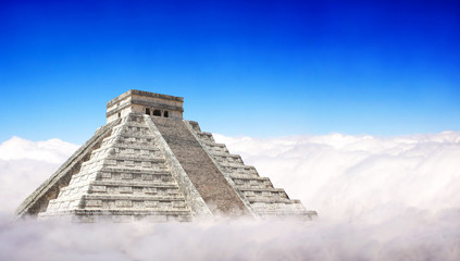 Fototapeta na wymiar Giant Mayan Pyramid with a base hidden in the clouds