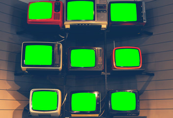 Classic Vintage Retro Style old televisions with cut out screen, old televisions with green screen on isolated background.