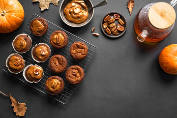 Obraz na płótnie Canvas Autumn Pumpkin Muffins with Caramel and Pecans
