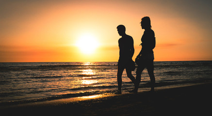 couple at the sunset beach