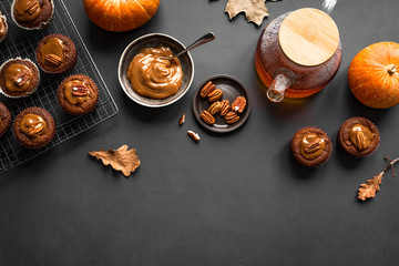 Fototapeta na wymiar Autumn Pumpkin Muffins with Caramel and Pecans