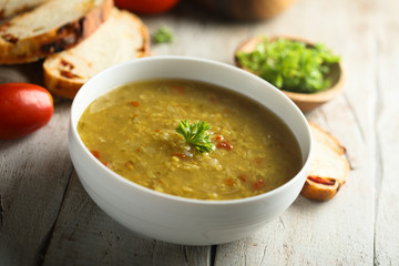 Traditional homemade lentil soup with fresh parsley