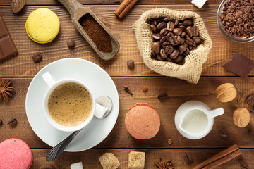 cup of coffee on wood background