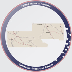 Fototapeta premium Round button with detailed map of Montrose County in Colorado, USA.