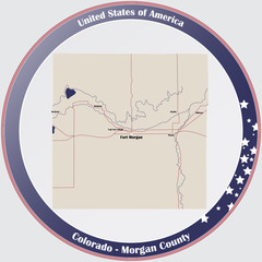 Fototapeta premium Round button with detailed map of Morgan County in Colorado, USA.