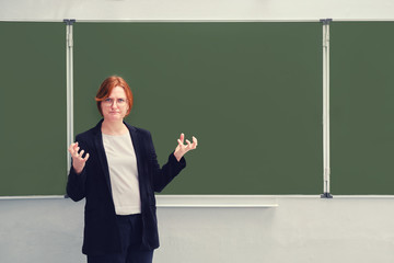 The school teacher is angry at the blackboard. Concept of problems in learning and bullying, copy...