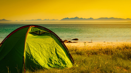 Seascape with tent on beach, Lofoten Norway