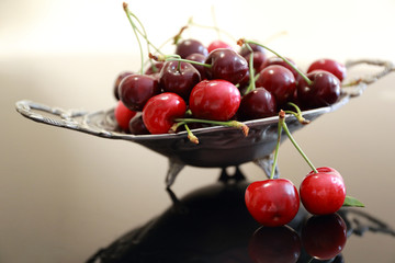 Cherry basket. cherry tree branch. fresh ripe cherries.