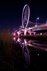 Night view of beautiful and colorful bridge reflection.