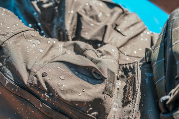 Selective focus shot of a person wearing waterproof pants