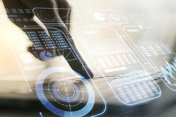 Abstract creative stats data concept with hands typing on laptop on background. Multiexposure