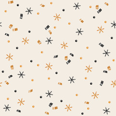 Seamless pattern with gold abd black Christmas decor - snowflakes, serpentine and foil confetti on light background.