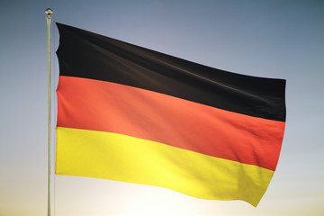Germany flag on sunset sky background