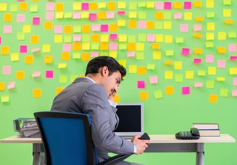 Businessman with many conflicting priorities