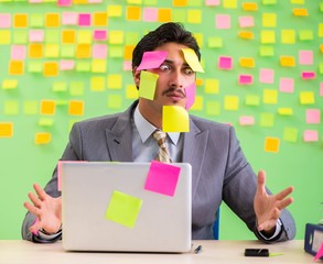 Businessman with many conflicting priorities