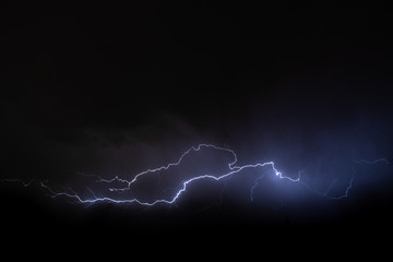 Lightning in dark sky