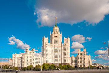 Fototapeta na wymiar Moscow / Russia - 15 Aug 2020: Panorama of the famous high-rise building in Moscow against the blue sky in Kotelnicheskaya embankment, river walks and tourist season