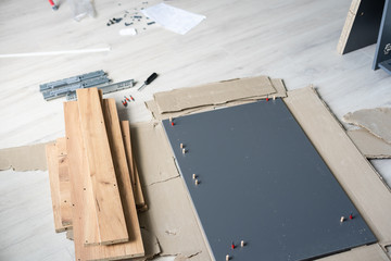 Assembling furniture installation of shelves with new apartment a shelf new home construction of interior room