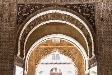 Ornate arches of Camares Patio in Alhambra, Granada, Spain