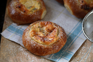 Russian Creamcheese Vatrushka Buns. Sweet buns with cottage cheese and raisins.