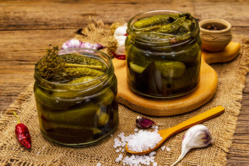Marinated pickled cucumbers with spices and herbs