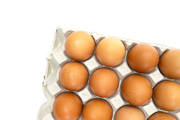Chicken eggs in paper tray on white background. close-up. selective focus, soft focus.