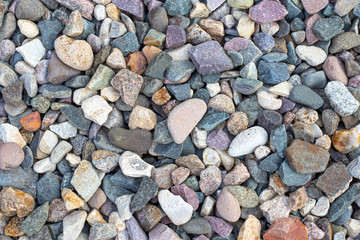 Different size and color stone background. Outdoor background design. Gravel path background . Close up