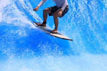 surfer rides the ocean wave