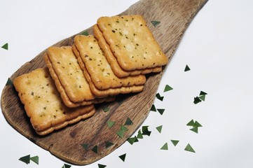 Sandwich crackers with cheese cream on wooden board. Top View. Flat Lay